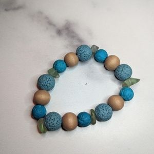Handcrafted wooden and lava stone bracelet